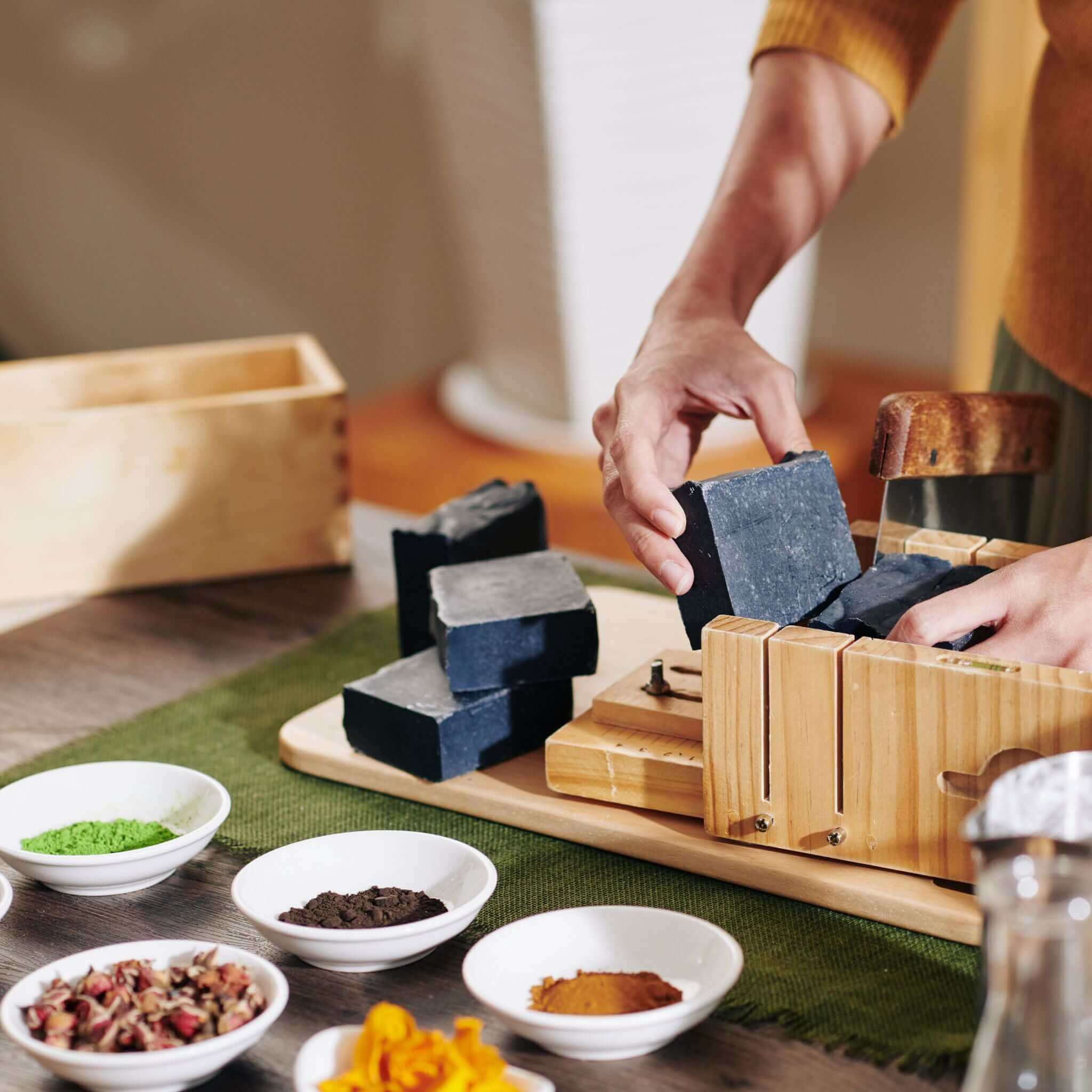 Cutting handmade soap into individual bars